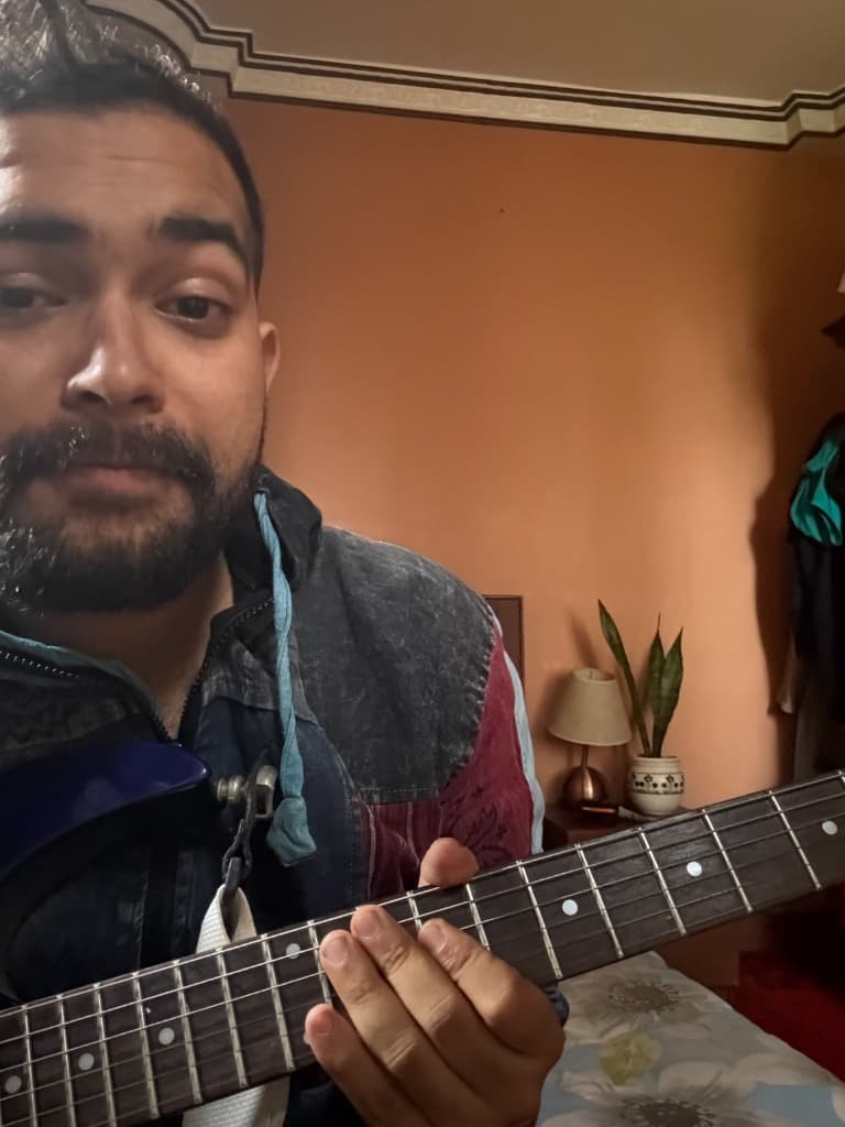 Practicing electric guitar close-up