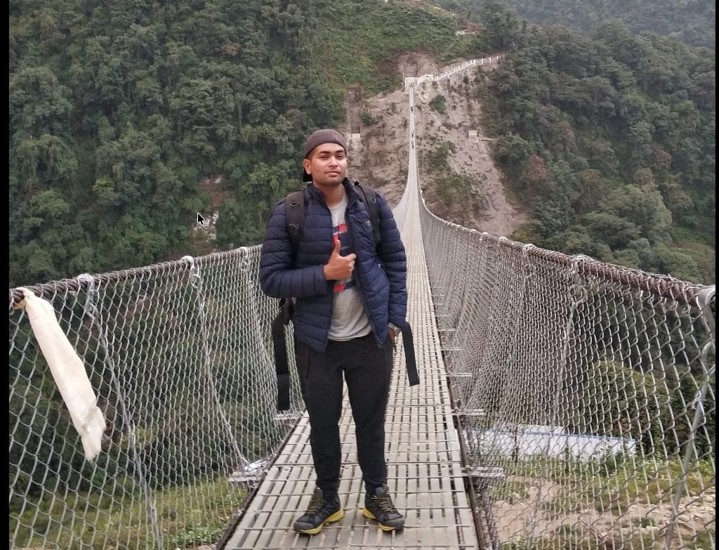 Standing on a suspension bridge